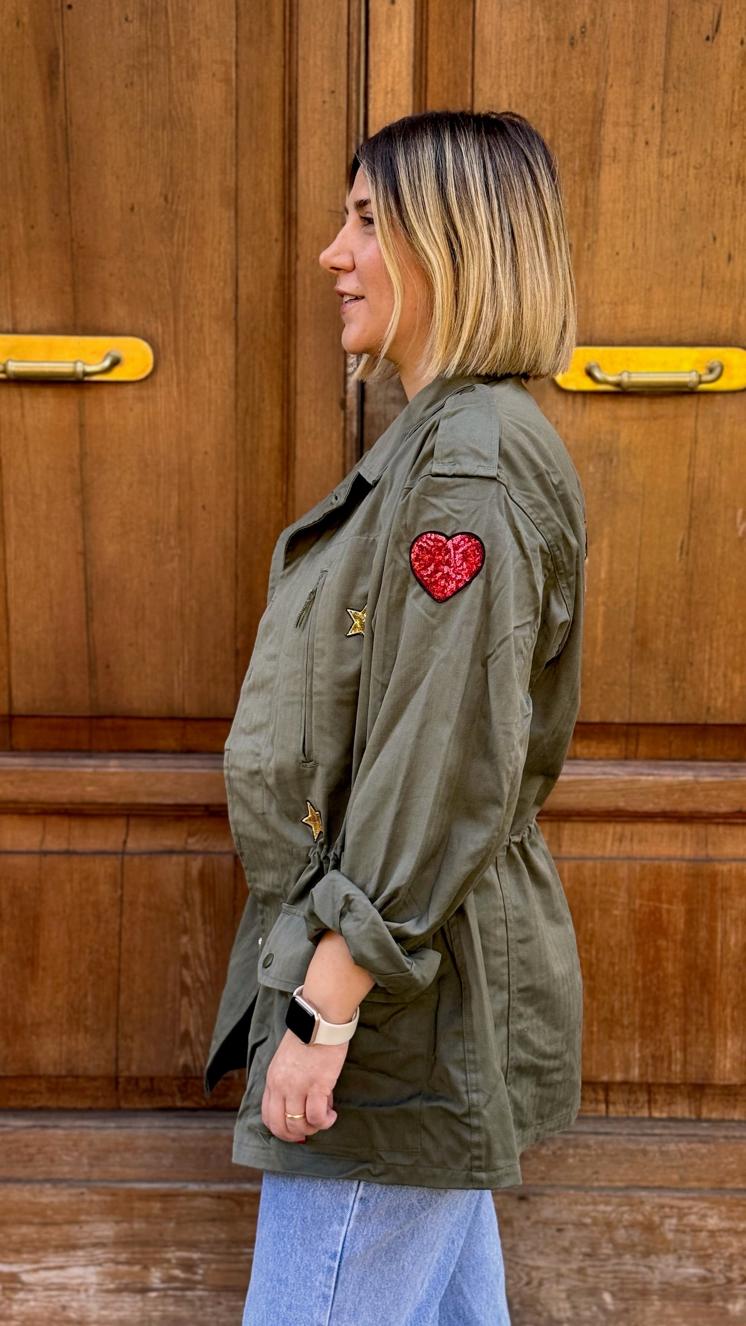 GIACCA VERDE CON APPLICAZIONE CUORE