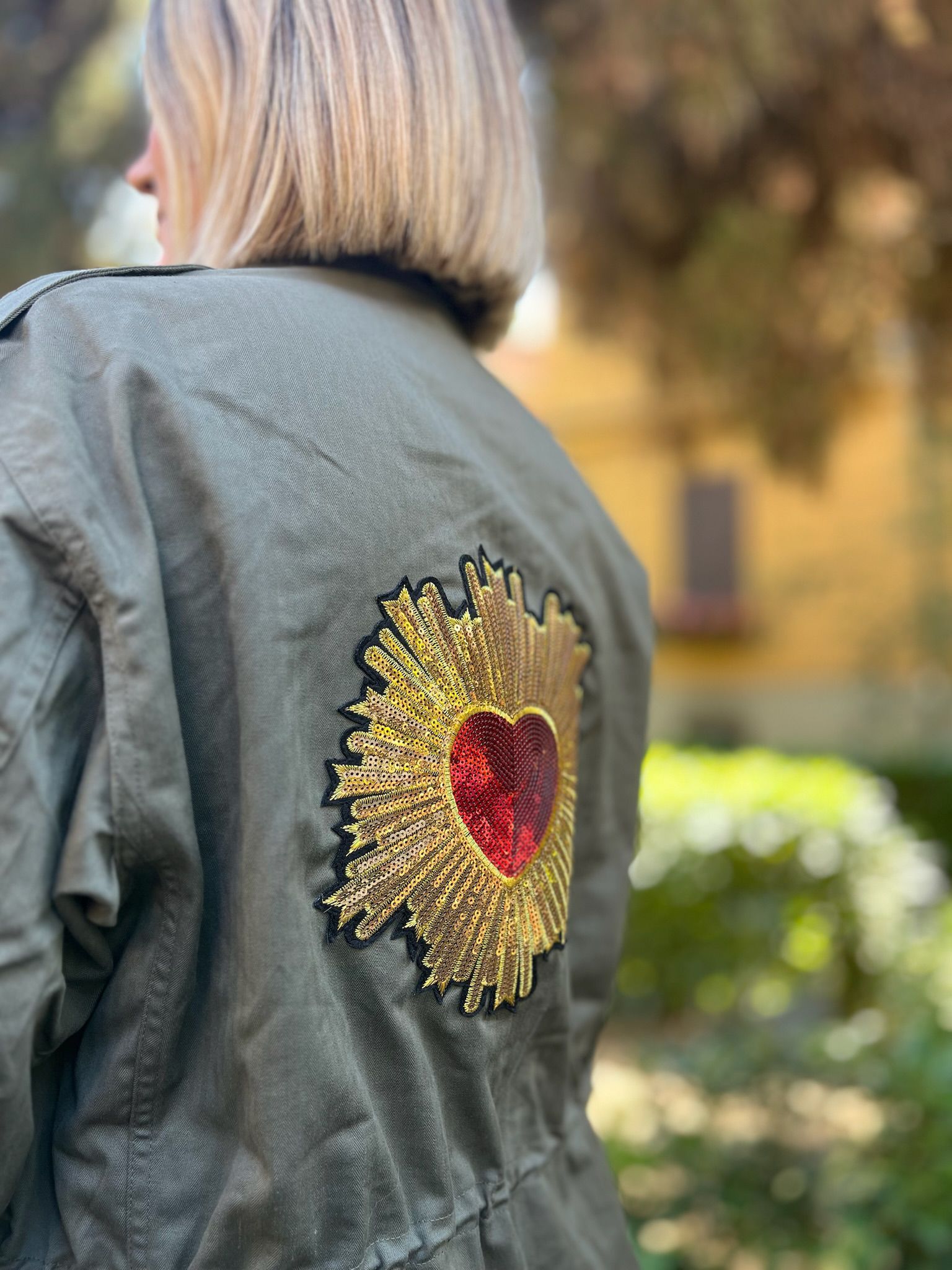 GIACCA VERDE CON APPLICAZIONE CUORE